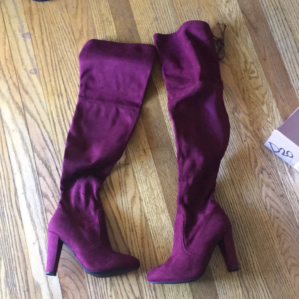 Brand new wine colored high heeled boots from Charlotte Russe